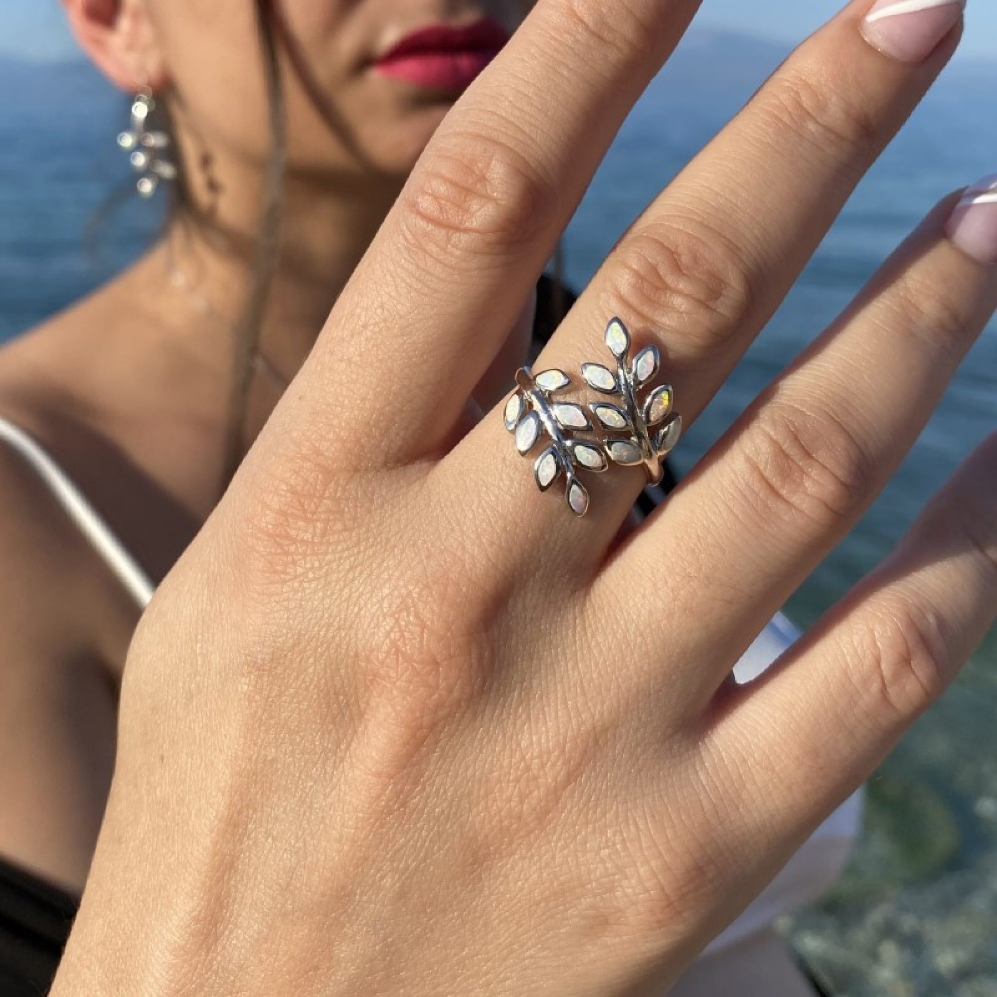 Silver olive branch ring with white opal