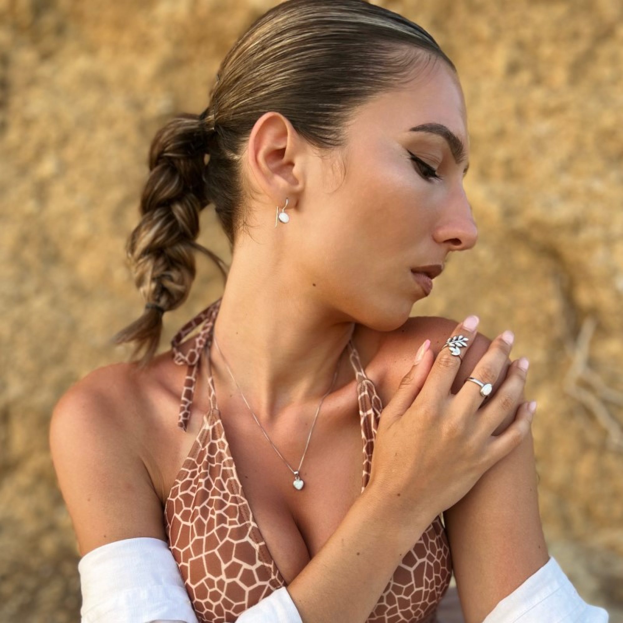 Silver olive branch ring with white opal