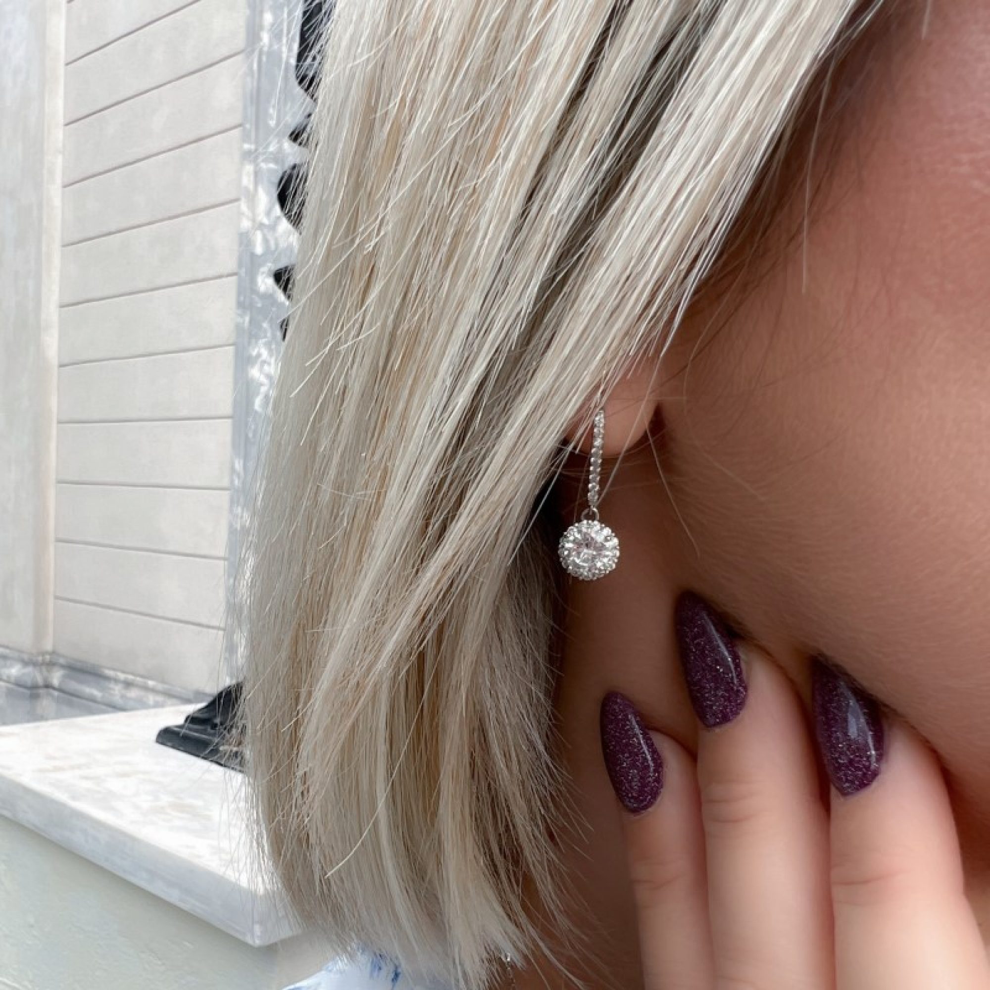 Silver earrings with zircon stones