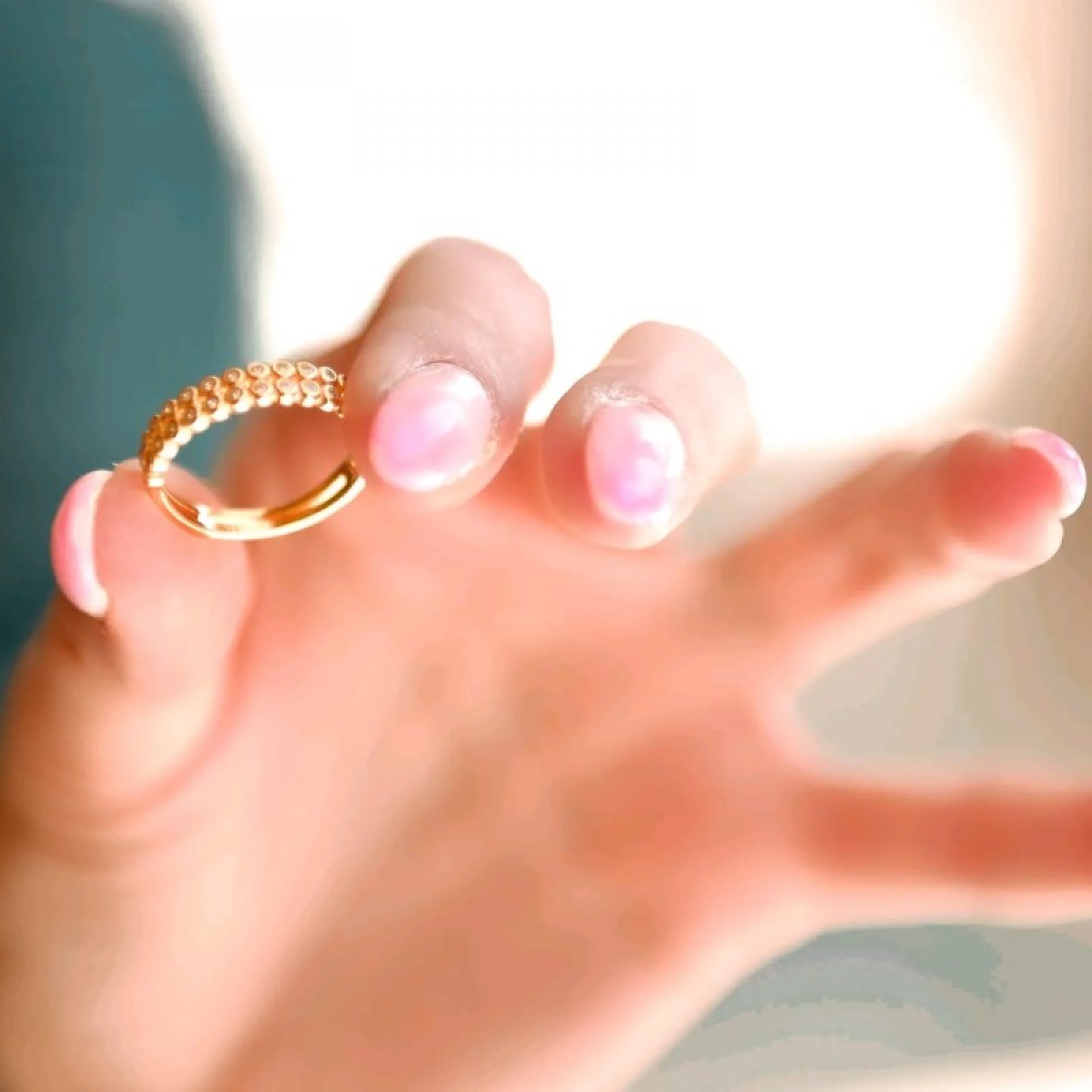 Gold plated ring with zircon stones